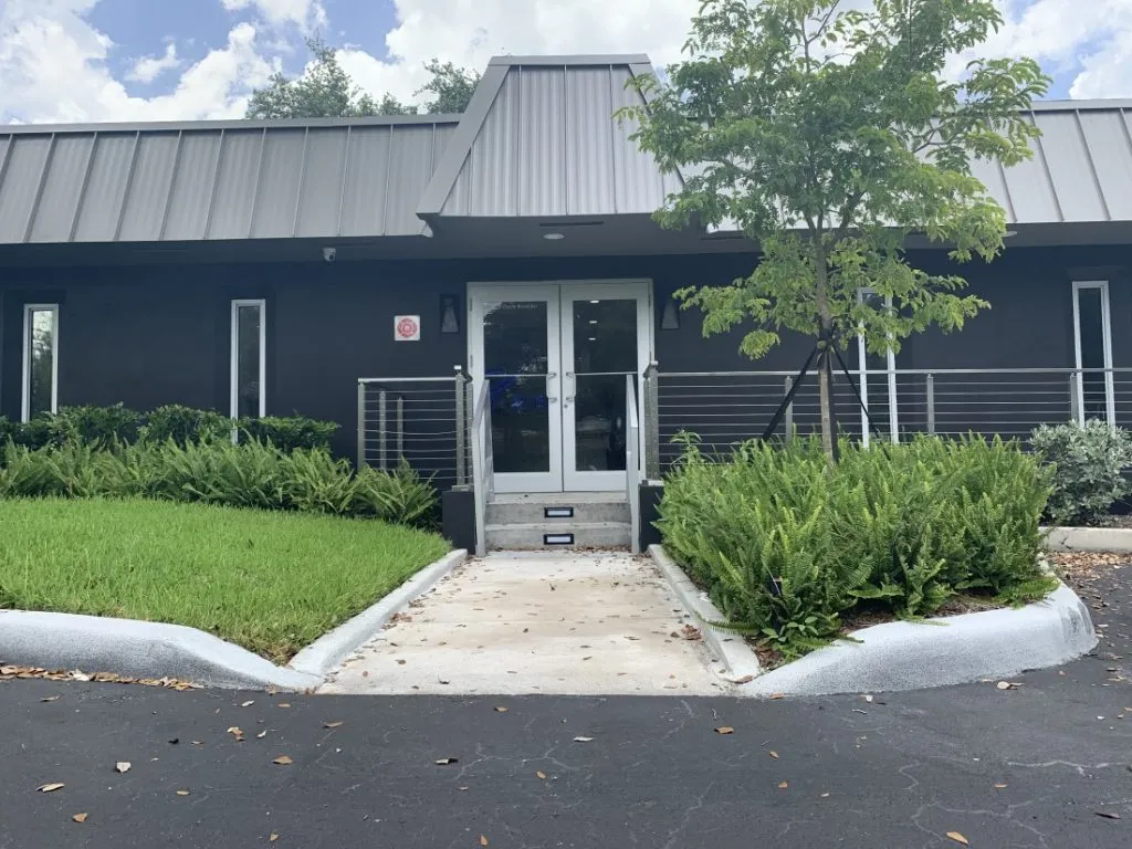 Glass entrance doors of the Miami Eye Institute building